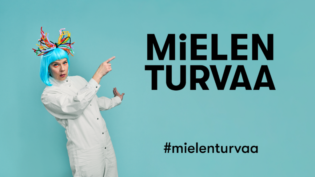 Sinitukkainen nainen osoittaa Mielenturvaa-otsikkoa.